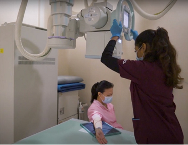 Nurse Conducting Radiography Scan